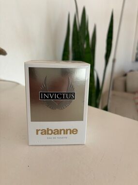 Paco Rabanne Invictus Eau de Toilette - White & Silver with Gold Logo